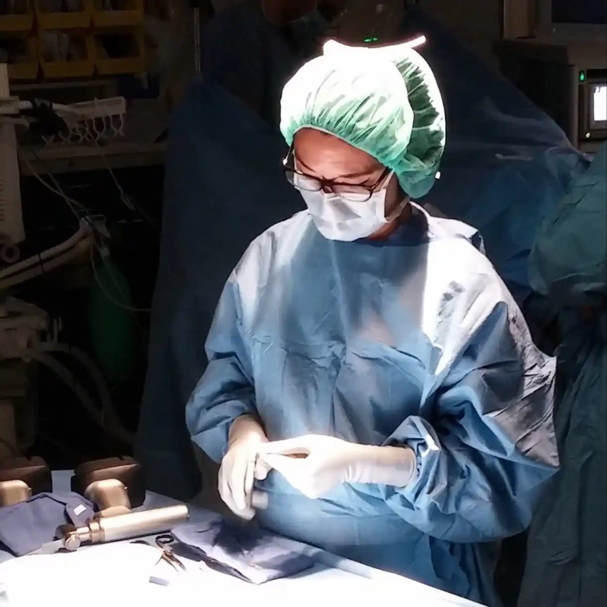 Dr. Vonda Wright in surgical scrubs in the operating room