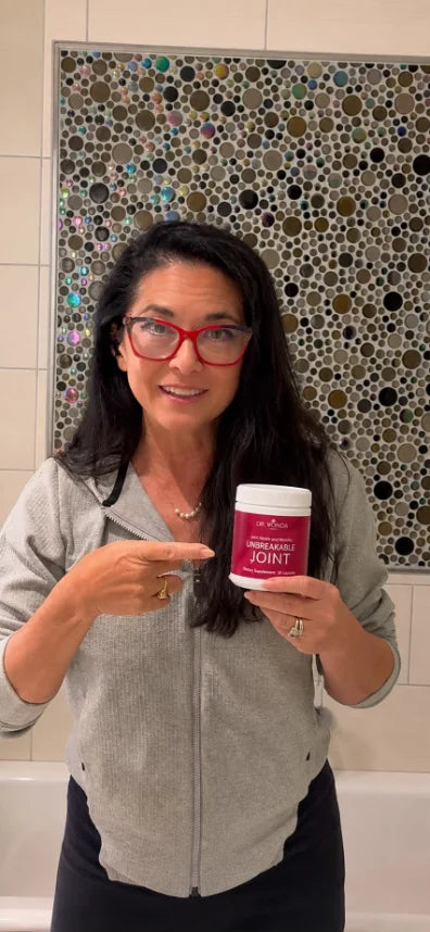 Dr. Vonda Wright holding UNBREAKABLE Joint